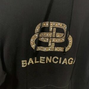 Balenciaga Black Hoodie with Gold Crystal Emblem